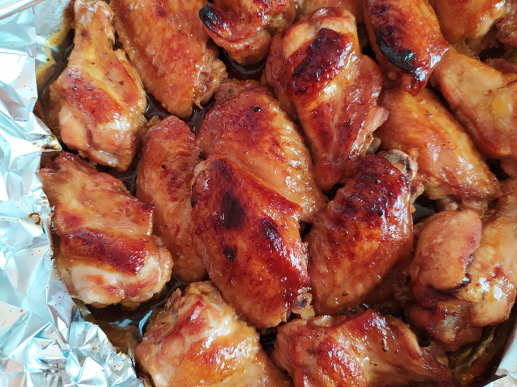 Рецепт куриных крыльев, запеченных в духовке до золотистой корочки в кисло-сладком маринаде